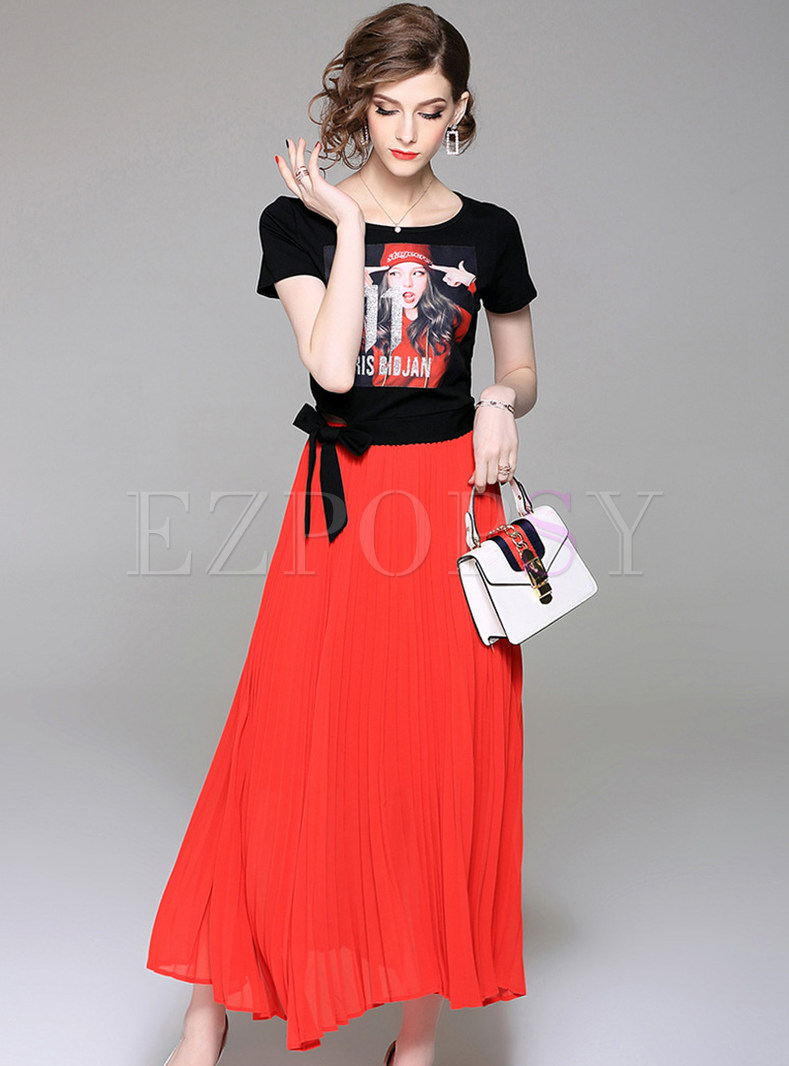 black top and red long skirt