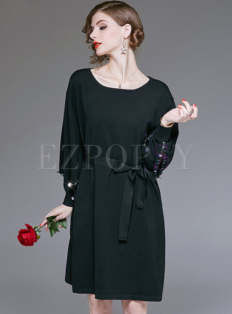 black batwing belted dress