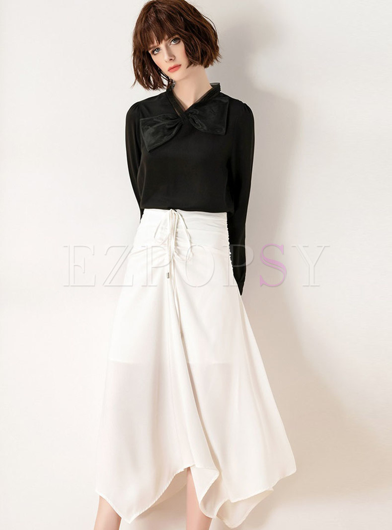 black blouse white skirt