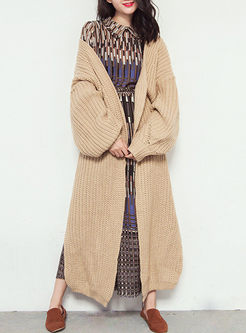 Long loose side slit lantern sleeve knitted coat