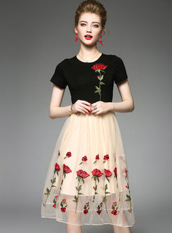 Brief Fashionable Knitted Splicing Gauze Rose Short Sleeve Skater Dress 