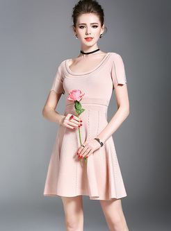 Brief Hollow Waist O-neck Pink Knitted Dress