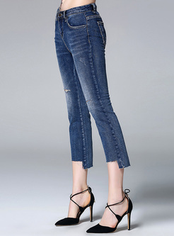 Brief Hole Asymmetric Hem Slim Jeans