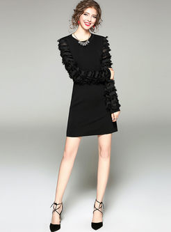 Stylish Feather Tassel Long Sleeve Knitted Dress