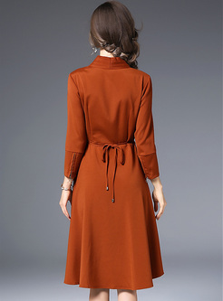 Brief Tied-waist Asymmetric Hem A-line Dress