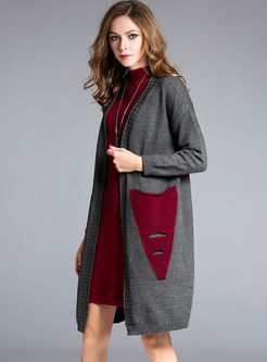Stylish Hole Hit Color Long Sleeve Knitted Coat