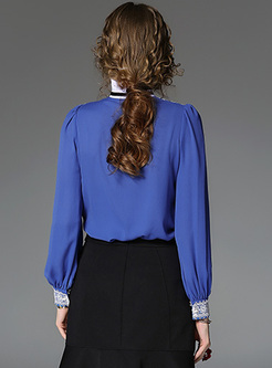 Chic Stand Collar Color-blocked Lantern Sleeve Blouse