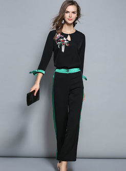 Black Embroidery O-neck T-shirt & Hit Color Striped Flare Pants
