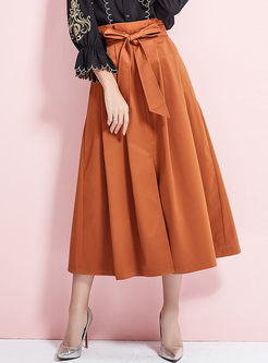 Stylish Pure Color Belted Hem Pleated Skirt