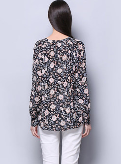 Chic V-neck Printed Silk Blouse With Button Embellishment