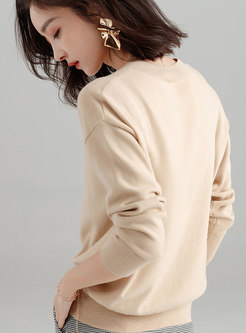 Color-blocked V-neck Asymmetric Pullover Sweater