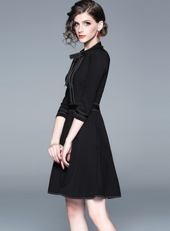Brief Solid Color Bowknot Splicing Skater Dress
