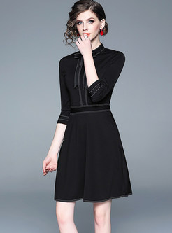 Brief Solid Color Bowknot Splicing Skater Dress