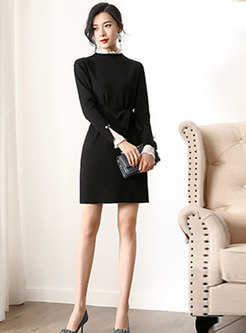 Color-blocked Stand Collar Belted Knitted Dress