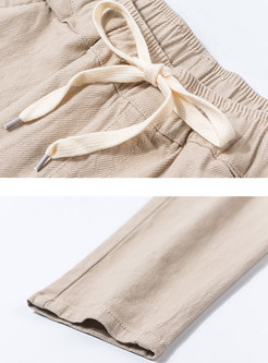Elastic Waist Tied Solid Color Harem Pants
