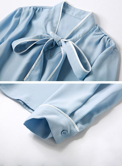 Color-blocked Stand Collar Bowknot Blouse & High Waist Mini Skirt