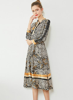 Elegant Leopard Tie-collar Slim Skater Dress