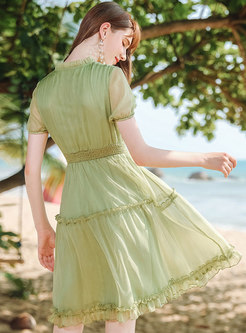 Chiffon Stand Collar Tied Pleated Skater Dress