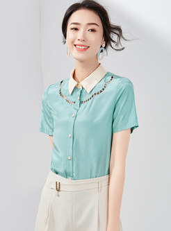 Stylish Hollow Out Lapel Embroidered Blouse