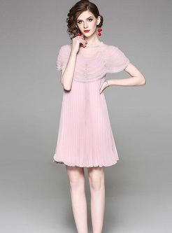 Sequined Solid Color O-Neck Short Sleeves Pleated Dresses