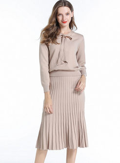 Solid Color Bowknot Sweater & Pleated Skirt
