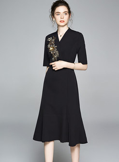 Elegant V-neck Embroidered Peplum Dress