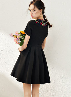Embroidered Crew Neck Ruched Skater Dress