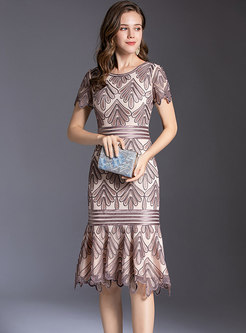 Elegant Embroidered Sheath Peplum Dress