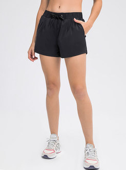 Solid Drawcord Ruched Yoga Shorts With Pockets