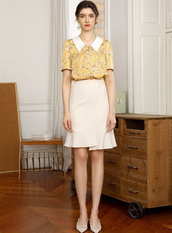 High Waisted Asymmetric Mini Peplum Skirt