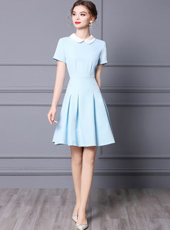Color-blocked Lapel High Waisted Pleated Skater Dress