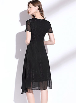 Black High Waisted Pleated Asymmetric Skater Dress