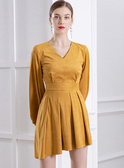 Long Sleeve High Waisted Asymmetric Mini Dress