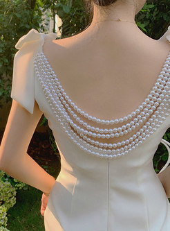Pearl Embellished Scoop Back Cocktail Dresses